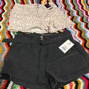 NWT NO BOUNDARIES 2 Pairs of Shorts for $15. A black pair and a pink floral pair